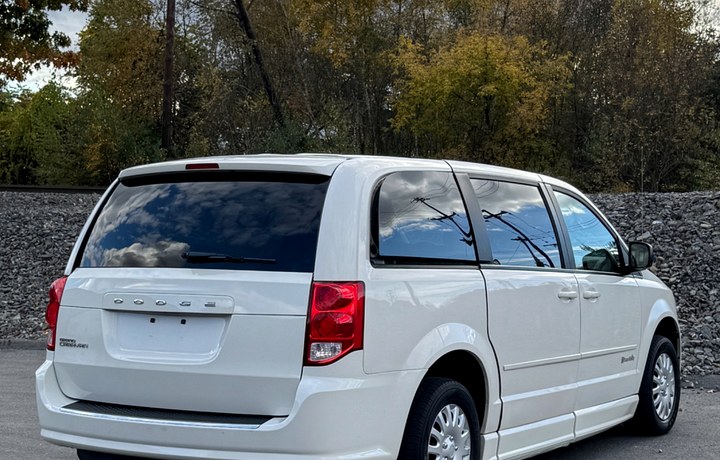 White Dodge Grand Caravan wheelchair accessible van